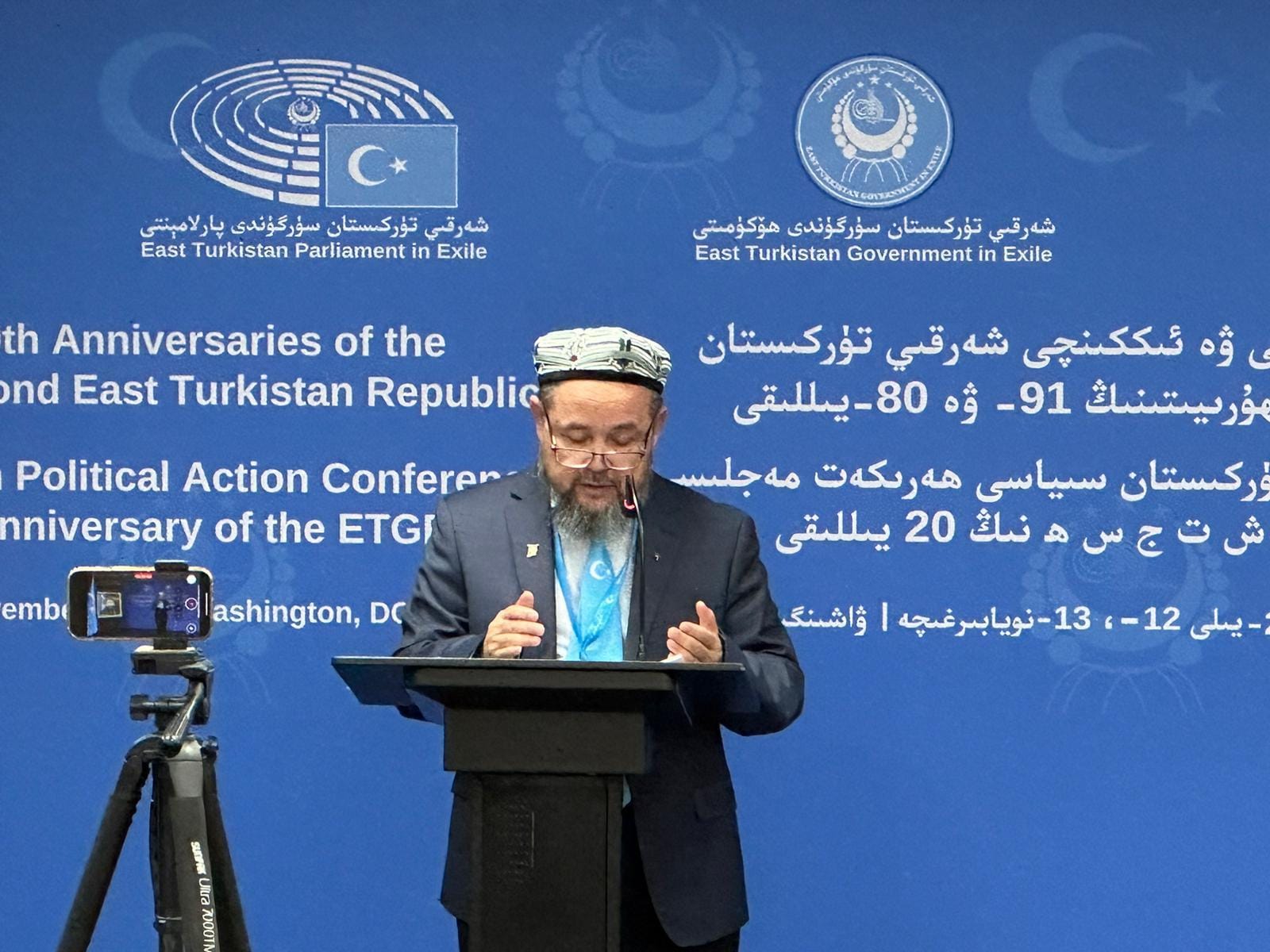 Abdulahad Nur delivering remarks at a podium in Washington.